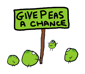 Some peas with a placard saying 